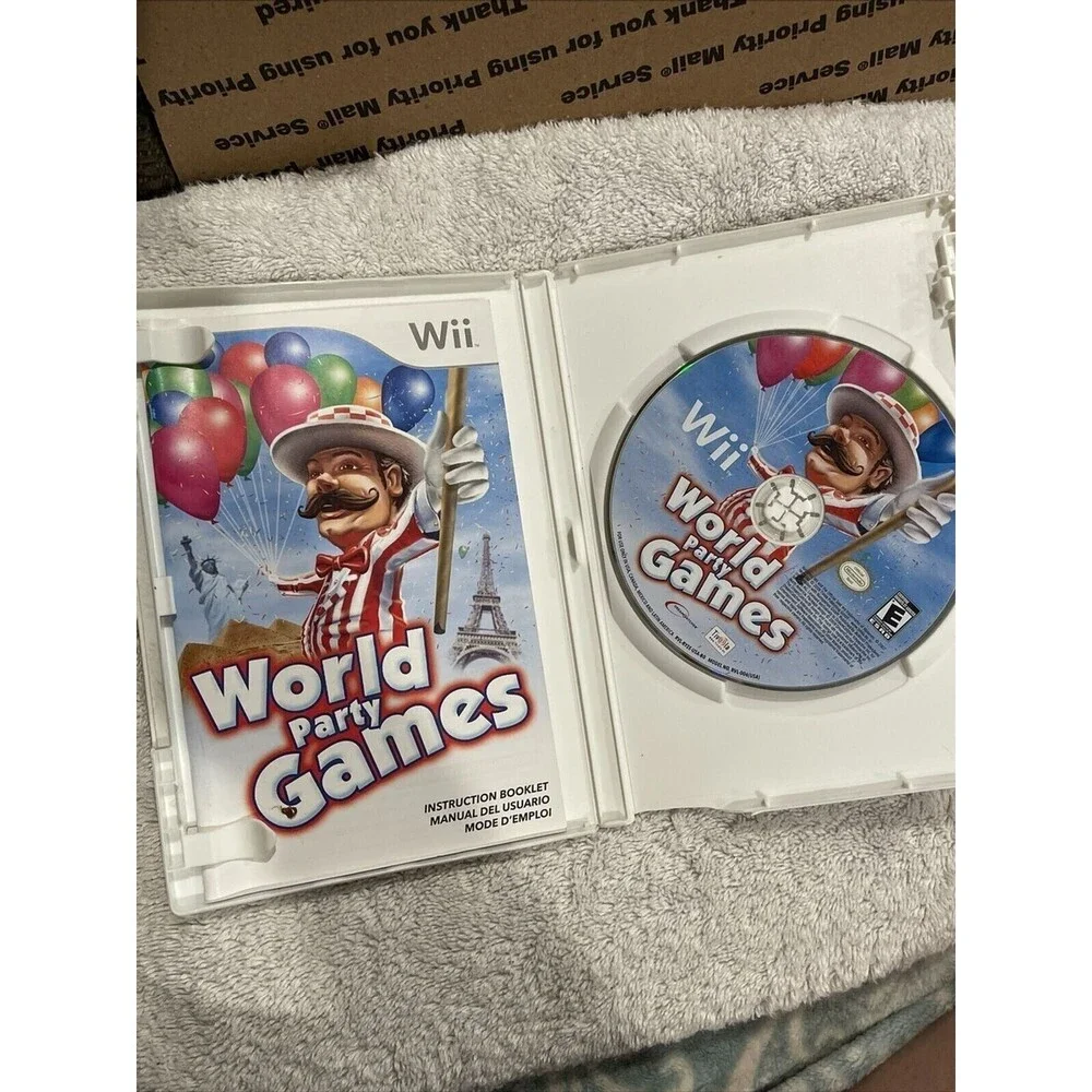 World Party Games (Nintendo Wii) TESTED COMPLETE CASE DISC BOOK Video Game